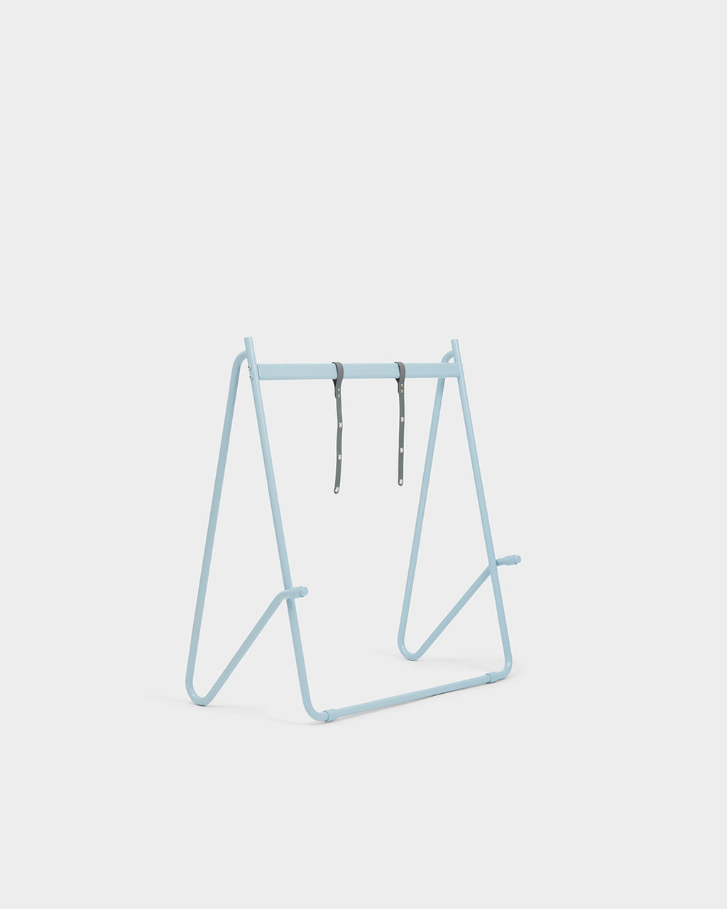 Bloom Stands Low in powder blue, angled studio view of A-frame metal stand with two grey leather hanging straps