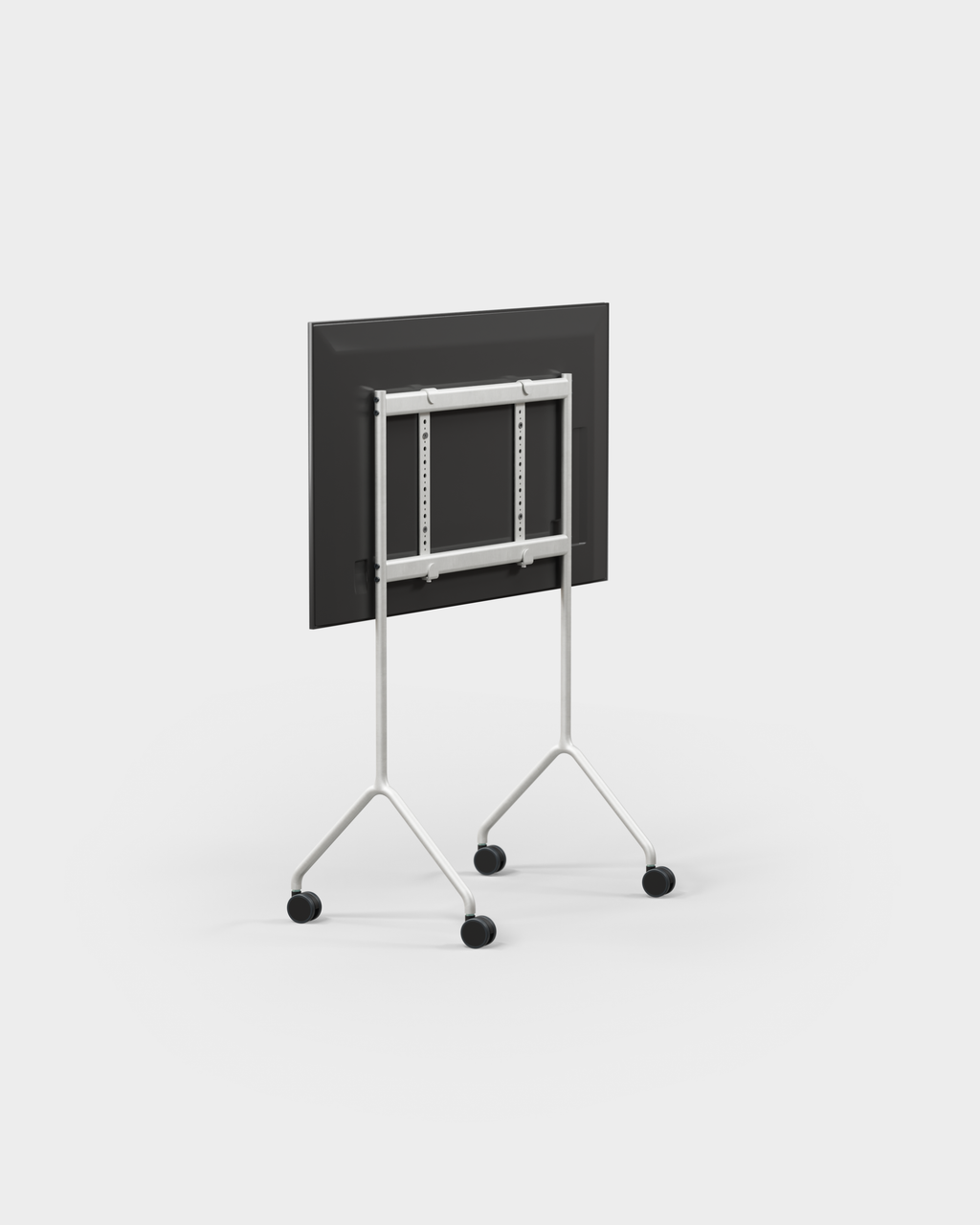 Rear view of Moon Light in Cloudy Silver TV stand with wheels, showing VESA mount bracket holding a display, studio shot