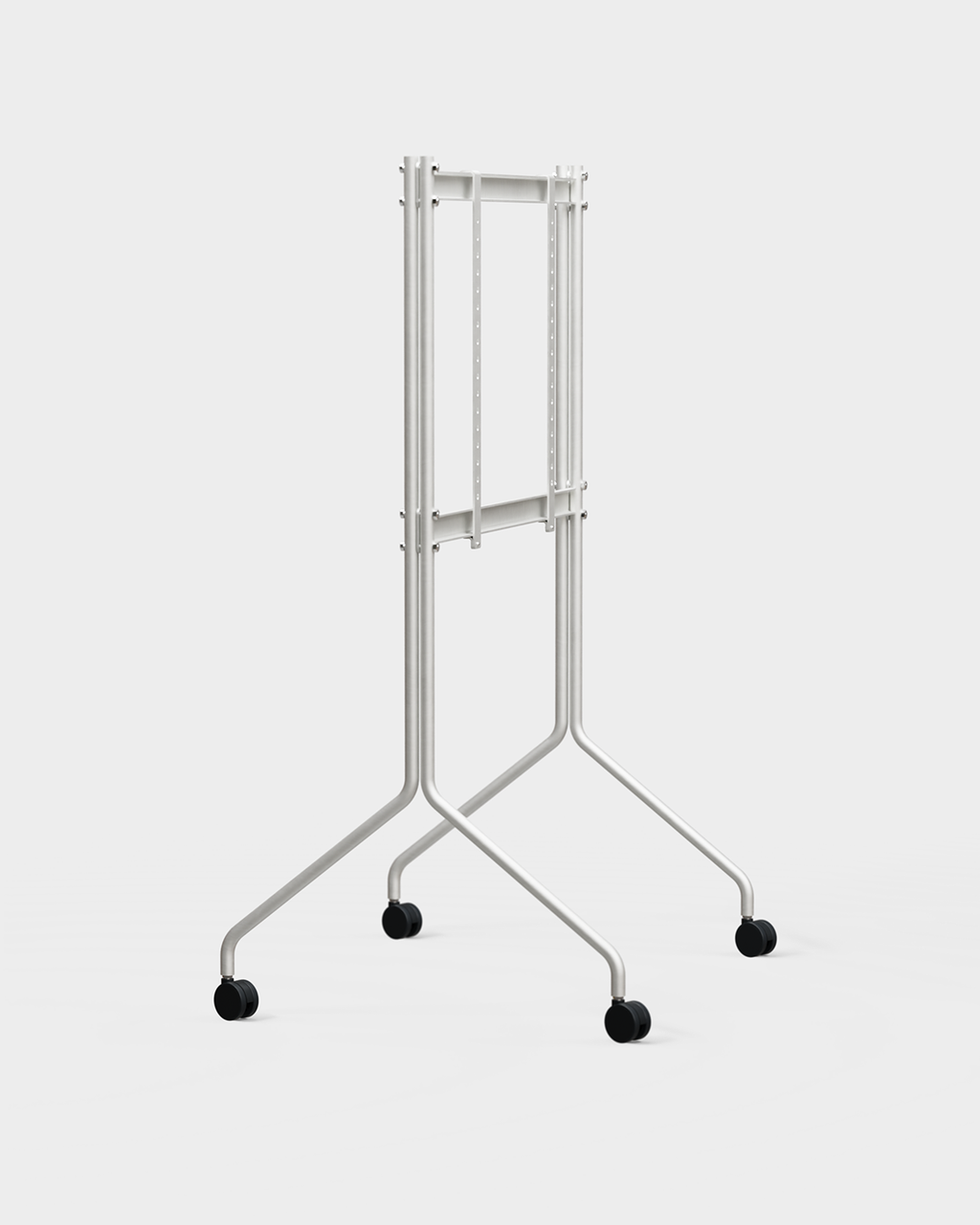 Moon Tall in Cloudy Silver rolling TV stand with mounted screen, angled studio packshot showing splayed legs and casters