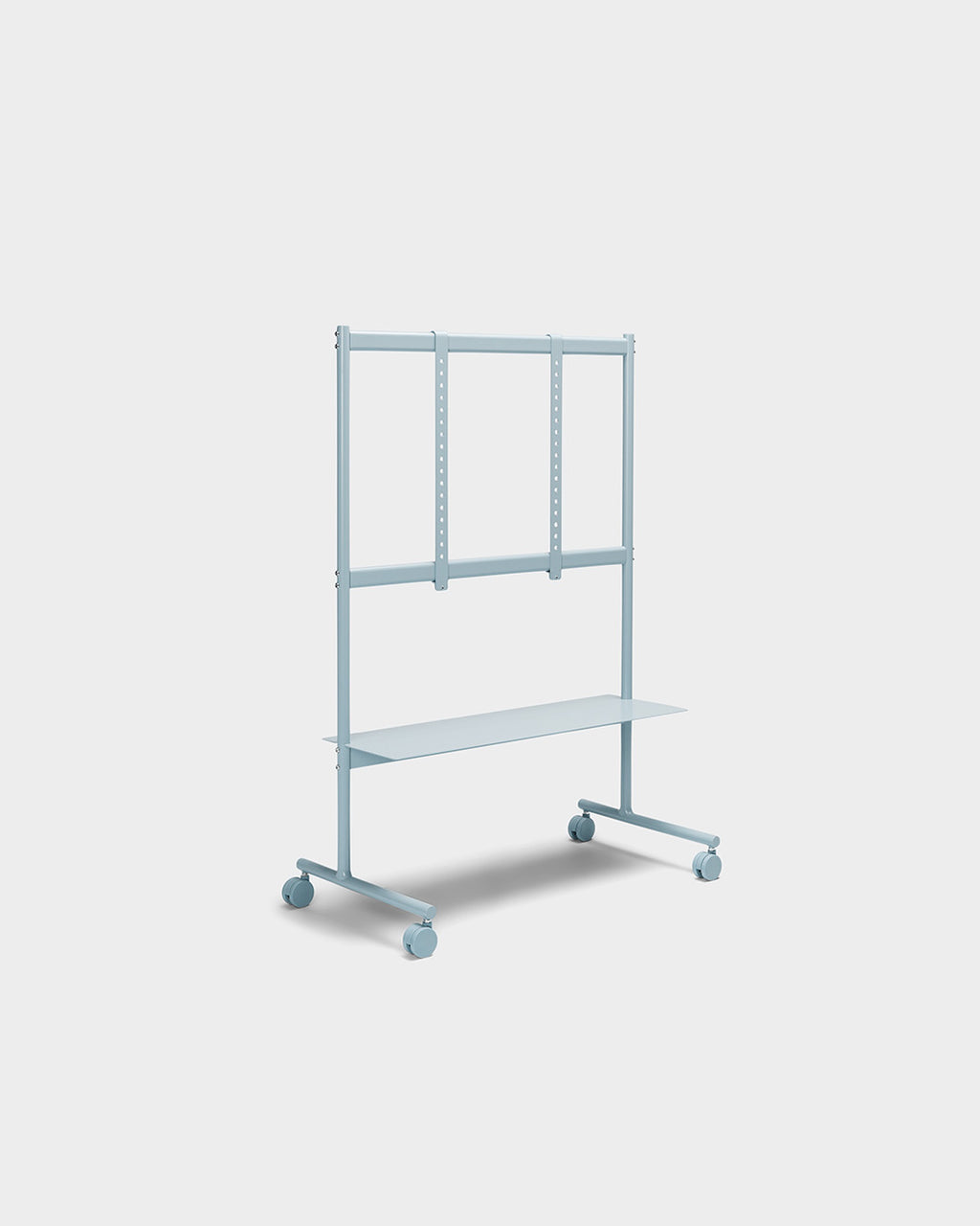 Rover mobile TV stand in Powder Blue, angled studio view showing shelf, VESA mount rails and locking caster wheels
